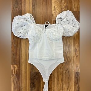 Brand new Express Eyelet Puff Sleeve Tie Neck Thong Bodysuit